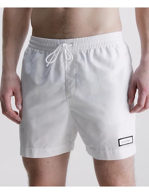 Ck - pantaloncini da bagno con cordoncino medio - core solids km0km00812-ycd classic white